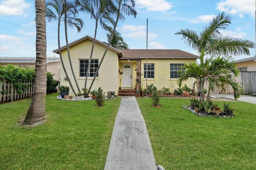 Discover this charming 1940s home in historic College Park, just - Beach Home for sale in Lake Worth Beach, Florida on Beachhouse.com