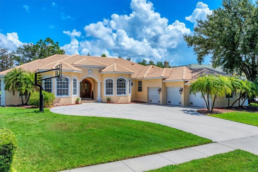 Nestled in the coveted community of Sorrento Woods, this - Beach Home for sale in Nokomis, Florida on Beachhouse.com