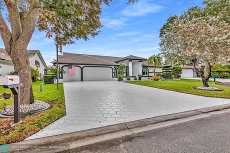 The hidden gem and majestically situated home in a quiet - Beach Home for sale in Coral Springs, Florida on Beachhouse.com