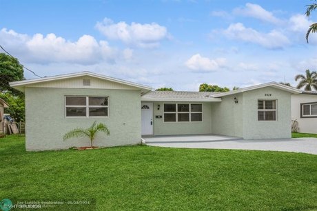 RENOVATED & UPGRADED Canal-front Home! LIKE NEW featuring 3 - Beach Home for sale in Cooper City, Florida on Beachhouse.com