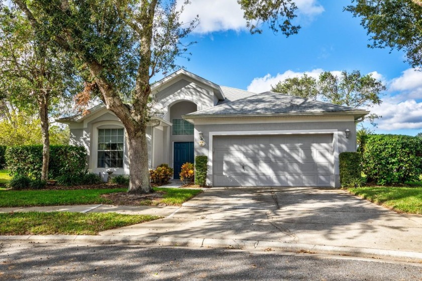 Nestled on a serene pond-view lot in the desirable Grand Haven - Beach Home for sale in Palm Coast, Florida on Beachhouse.com