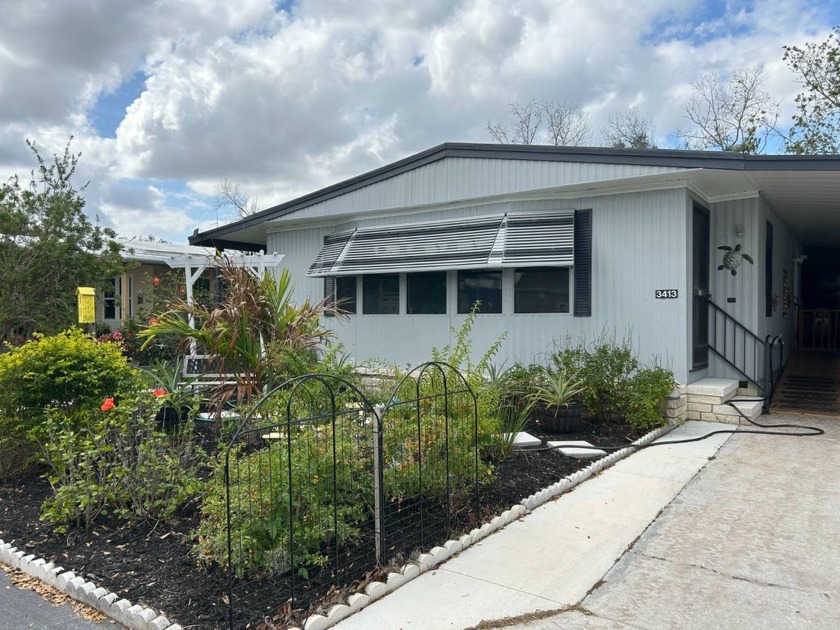 Charming Home with Stunning Preserve Views & Modern Updates on - Beach Home for sale in Ellenton, Florida on Beachhouse.com
