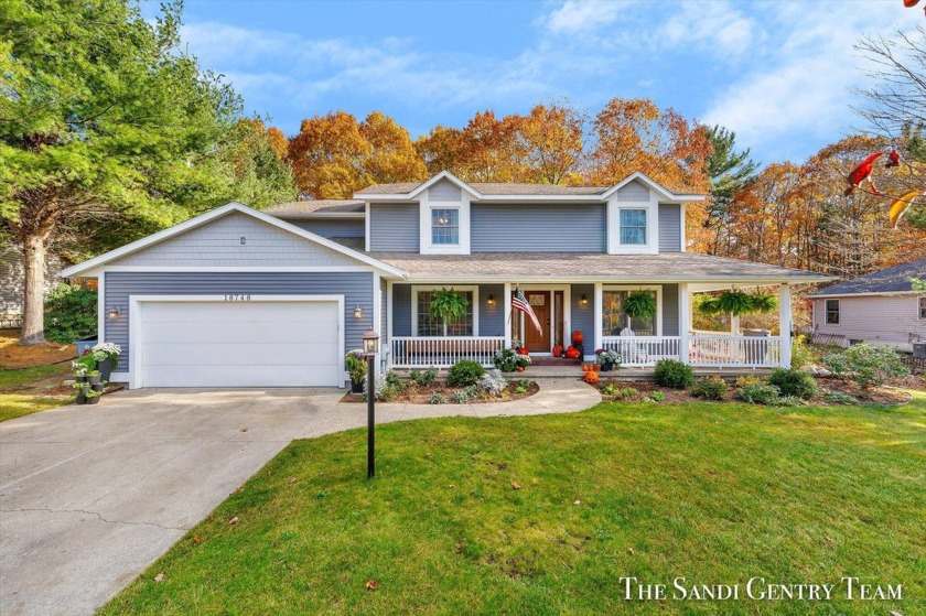 Welcome to this beautifully updated 4-bedroom, 2.5-bath home - Beach Home for sale in Spring Lake, Michigan on Beachhouse.com