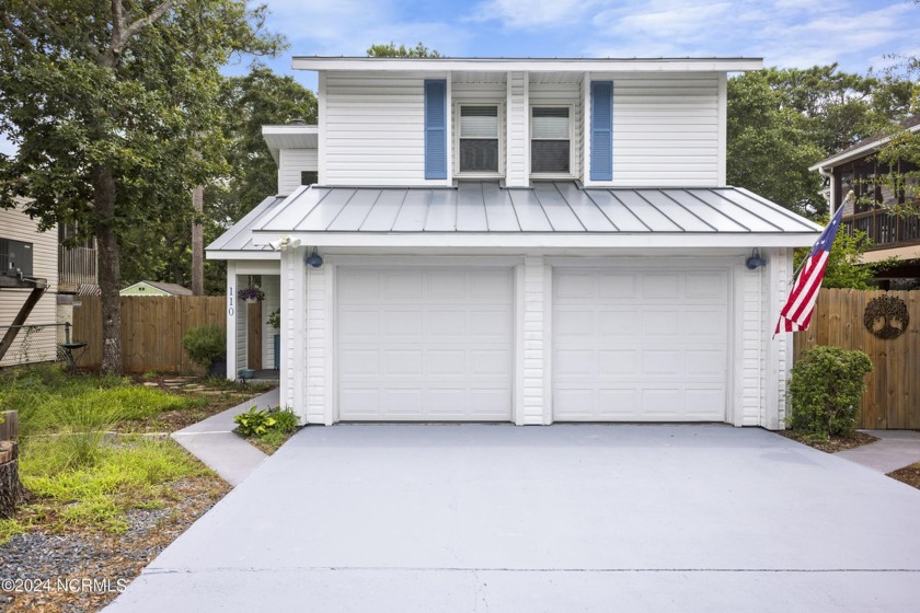 Discover coastal living at its finest in this beautiful, unique - Beach Home for sale in Oak Island, North Carolina on Beachhouse.com