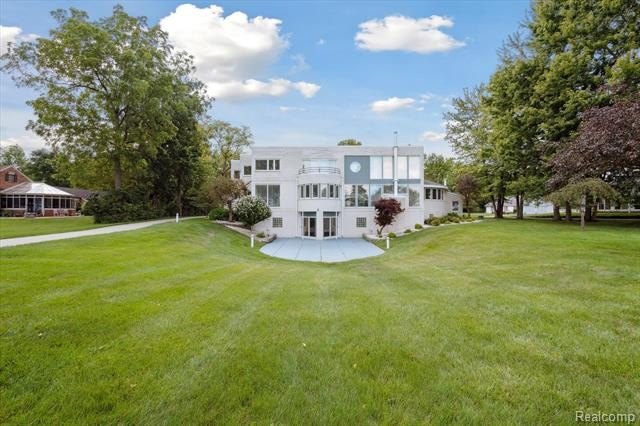 Discover this one-of-a-kind gem, a custom-built masterpiece by - Beach Home for sale in Grosse Ile, Michigan on Beachhouse.com