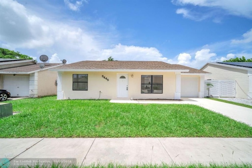 ELEGANTLY RENOVATED HOME !!!! 4 BEDROOMS, 2.5 BEDROOMS - Beach Home for sale in Lake Worth, Florida on Beachhouse.com