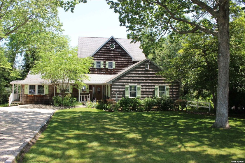 Located On 1.2 Stunning Acres On The Connetquot River Is This - Beach Home for sale in Great River, New York on Beachhouse.com