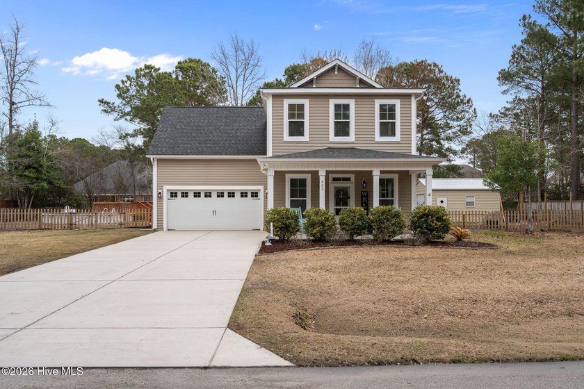 Move-in ready and packed with space, this beautiful 5-bedroom / - Beach Home for sale in Hampstead, North Carolina on Beachhouse.com