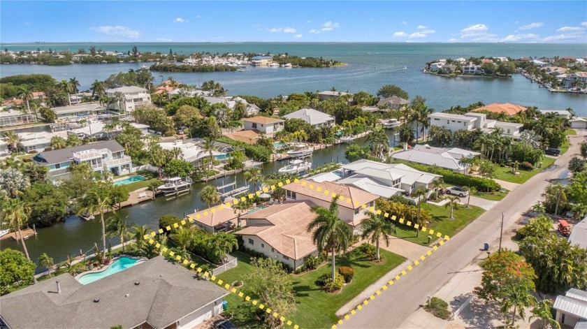 Discover EXQUISITE COASTAL LIVING in this stunning - Beach Home for sale in Holmes Beach, Florida on Beachhouse.com