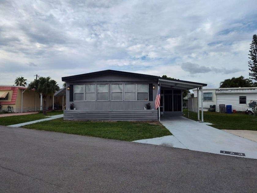 PRICED TO SELL!  Over 1,440 sq. ft, large front enclosed sunroom - Beach Home for sale in Sebastian, Florida on Beachhouse.com