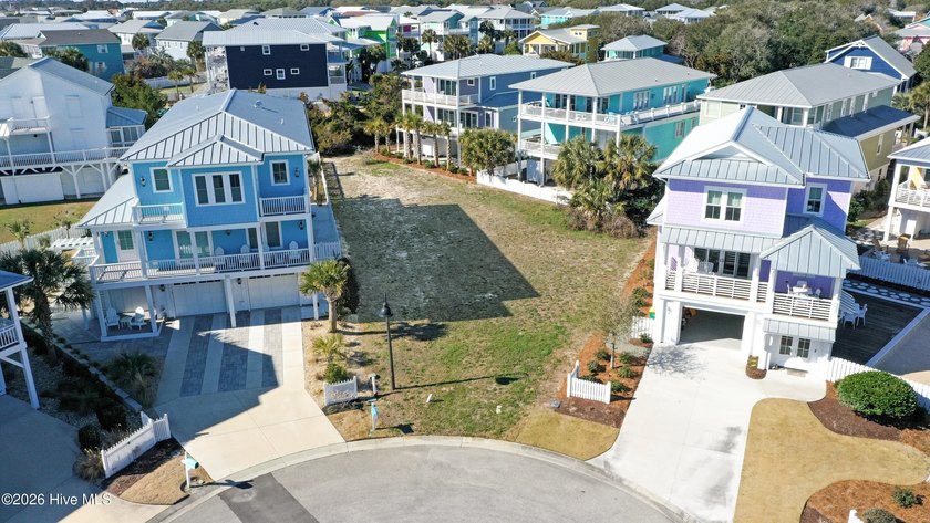 Tucked inside the coastal enclave of Seawatch, this homesite is - Beach Lot for sale in Kure Beach, North Carolina on Beachhouse.com