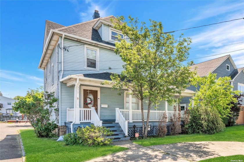 Come see this Charming Waterfront Victorian located in the - Beach Home for sale in Freeport, New York on Beachhouse.com