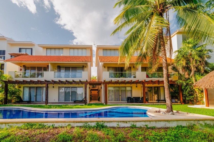 Experience luxury living in Puerto Aventuras with this beautiful - Beach Home for sale in Puerto Aventuras,  on Beachhouse.com