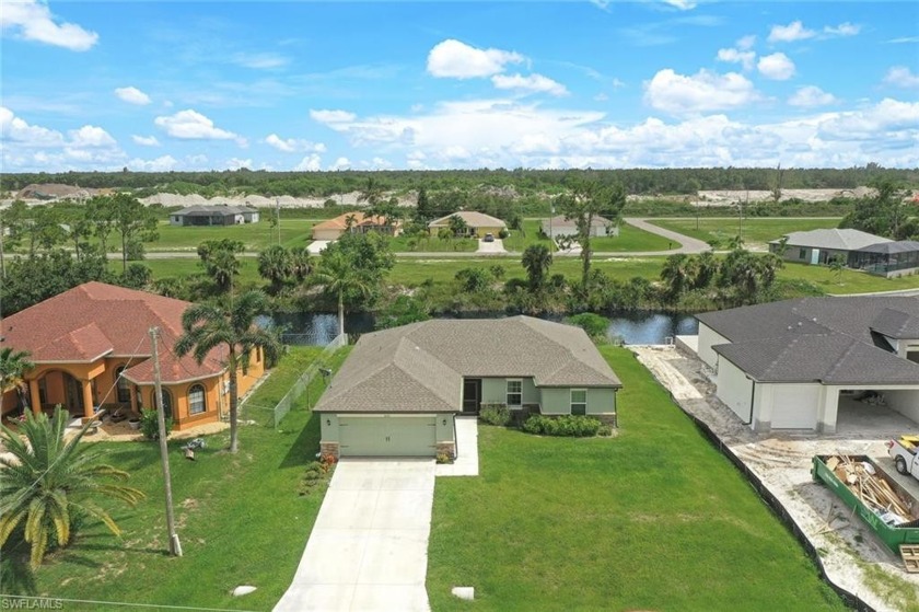 Welcome to this enchanting WATERFRONT property nestled in a safe - Beach Home for sale in Cape Coral, Florida on Beachhouse.com