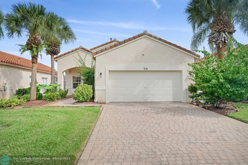 Renovated Beautiful 3br, 2ba, 2 car garage home with Lake View - Beach Home for sale in Port Saint Lucie, Florida on Beachhouse.com