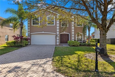 JUST REDUCED! Welcome home to Valencia Lakes, a gated, low HOA - Beach Home for sale in Naples, Florida on Beachhouse.com