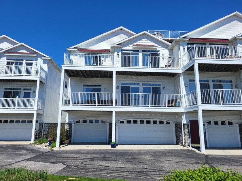 You will love waterfront living in this Ellenwood Condo, enjoy - Beach Condo for sale in Montague, Michigan on Beachhouse.com