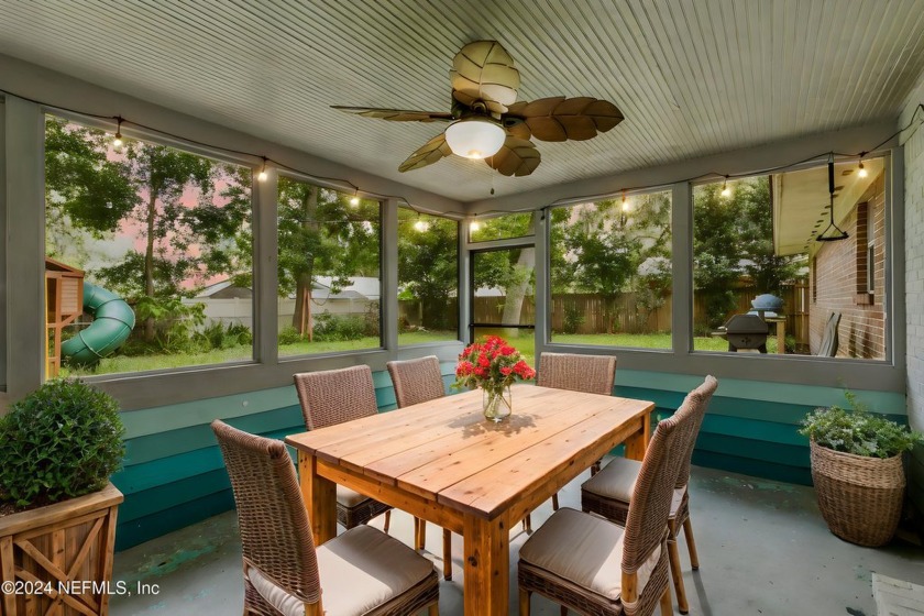 Nestled within a canopy of lush trees, this charming 1960s home - Beach Home for sale in Jacksonville, Florida on Beachhouse.com