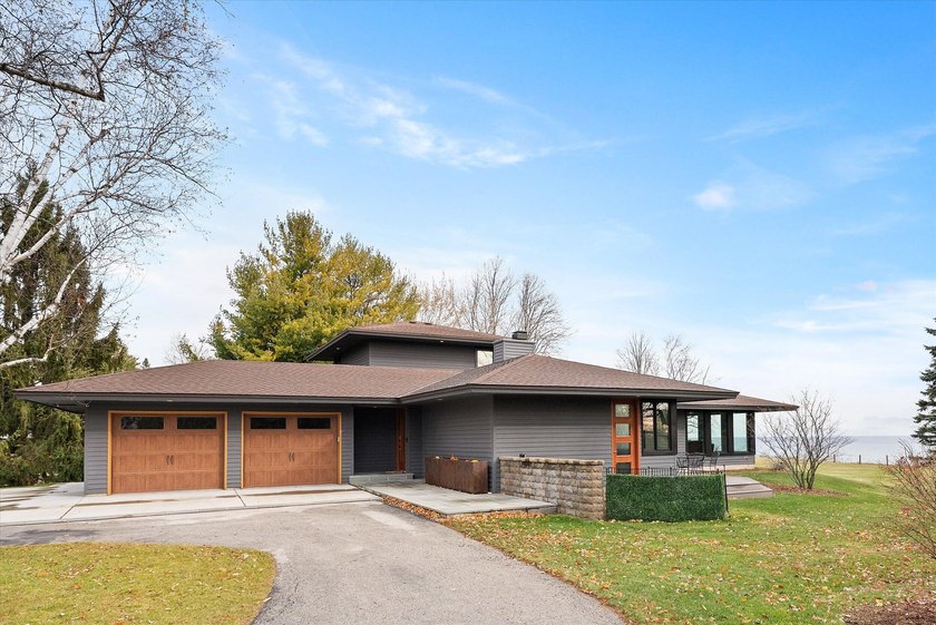 Experience breathtaking panoramic vistas of Lake Michigan from - Beach Home for sale in Grafton, Wisconsin on Beachhouse.com
