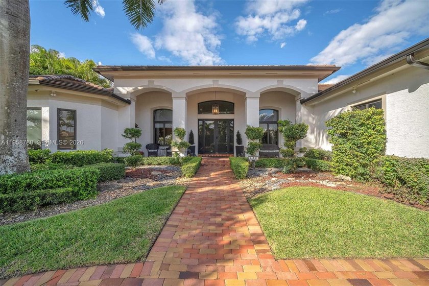 Exquisite Lakefront Estate in Gated Riverstone Community
 - Beach Home for sale in Davie, Florida on Beachhouse.com