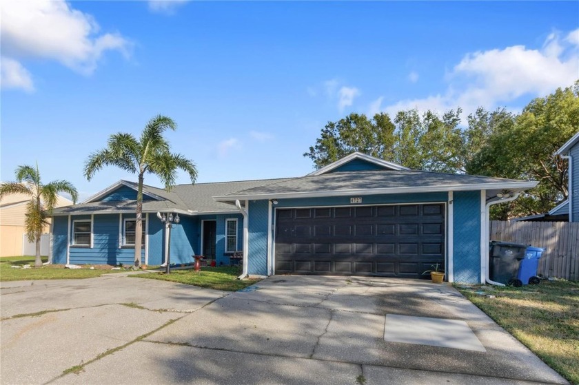 Discover the incredible potential of this spacious 4-bedroom, 2 - Beach Home for sale in Tampa, Florida on Beachhouse.com