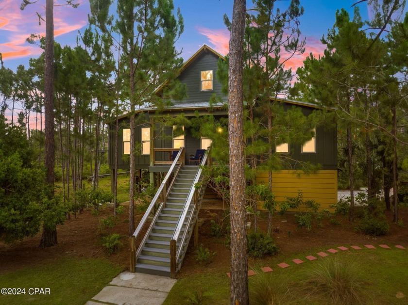 Discover the serene beauty of 7707 Magnolia Pond Trail, a - Beach Home for sale in Panama City Beach, Florida on Beachhouse.com