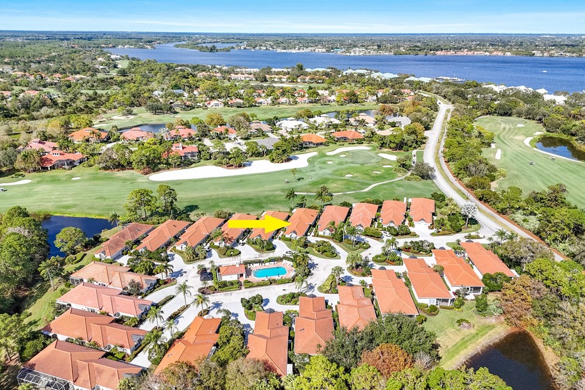 Tucked within the intimate enclave of Fig Tree Village, this - Beach Home for sale in Palm City, Florida on Beachhouse.com