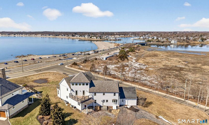 Perched high atop a scenic bluff, this extraordinary coastal - Beach Home for sale in Milford, Connecticut on Beachhouse.com