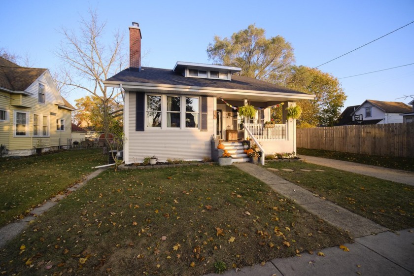 Don't miss this four bedroom, two bath craftsman style bungalow - Beach Home for sale in Manistee, Michigan on Beachhouse.com