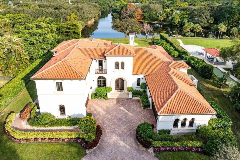 Discover exceptional luxury and stunning water views from this 7 - Beach Home for sale in Palm Beach Gardens, Florida on Beachhouse.com