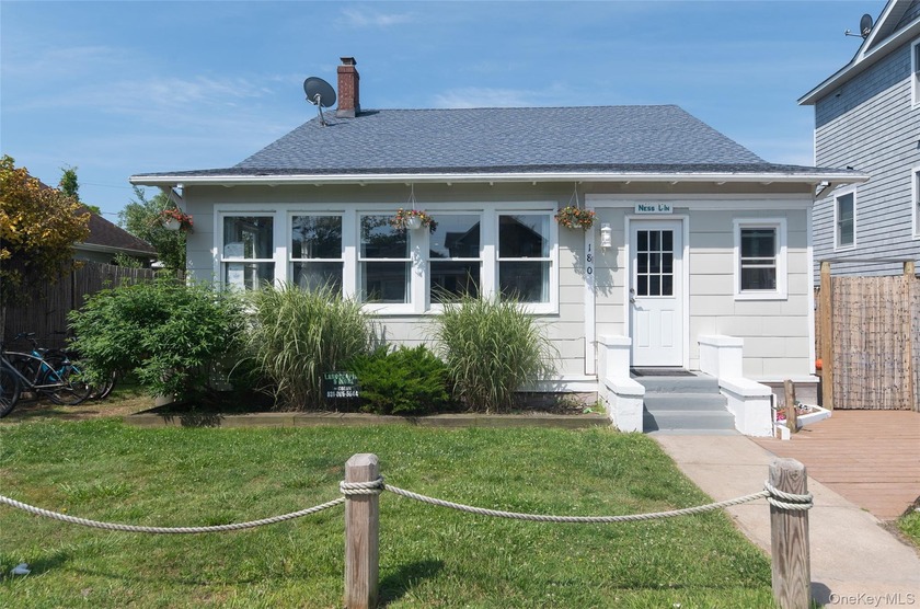 This beautifully maintained 5-bedroom, 2.5-bath home is a - Beach Home for sale in Ocean Beach, New York on Beachhouse.com