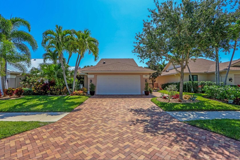 Beautiful Bluffs home located on a quiet street, just minutes - Beach Home for sale in Jupiter, Florida on Beachhouse.com