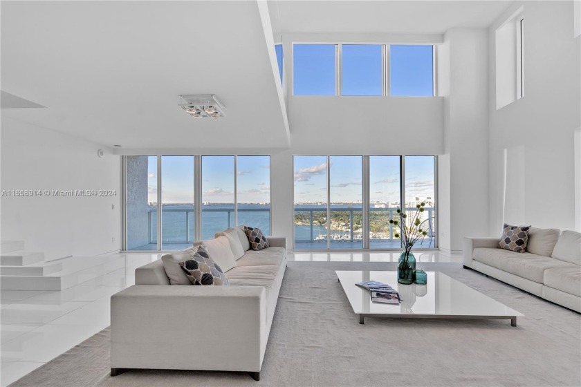 This exquisite two-story corner penthouse at The Grand Venetian - Beach Condo for sale in Miami Beach, Florida on Beachhouse.com