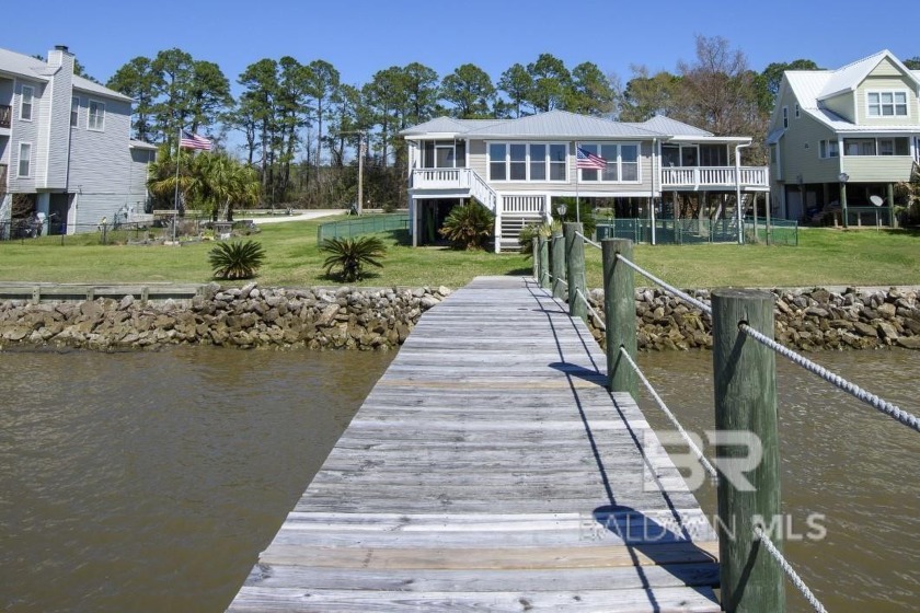 This stunning property boasts 75 feet of Mobile Bay waterfront - Beach Home for sale in Fairhope, Alabama on Beachhouse.com