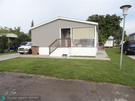 2 BEDROOM 2 BATH MOBILE HOME BUILT IN 2021.  THIS IS NOT A - Beach Home for sale in Pompano Beach, Florida on Beachhouse.com