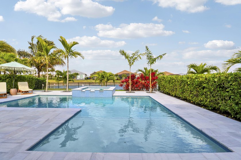 CASUAL ELEGANCE IN THIS BEAUTIFULLY UPGRADED LAKE FRONT POOL - Beach Home for sale in Port Saint Lucie, Florida on Beachhouse.com