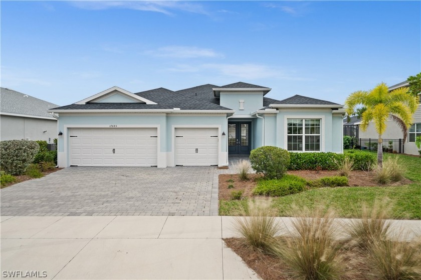 Step into your dream home through its grand French door entry - Beach Home for sale in Punta Gorda, Florida on Beachhouse.com