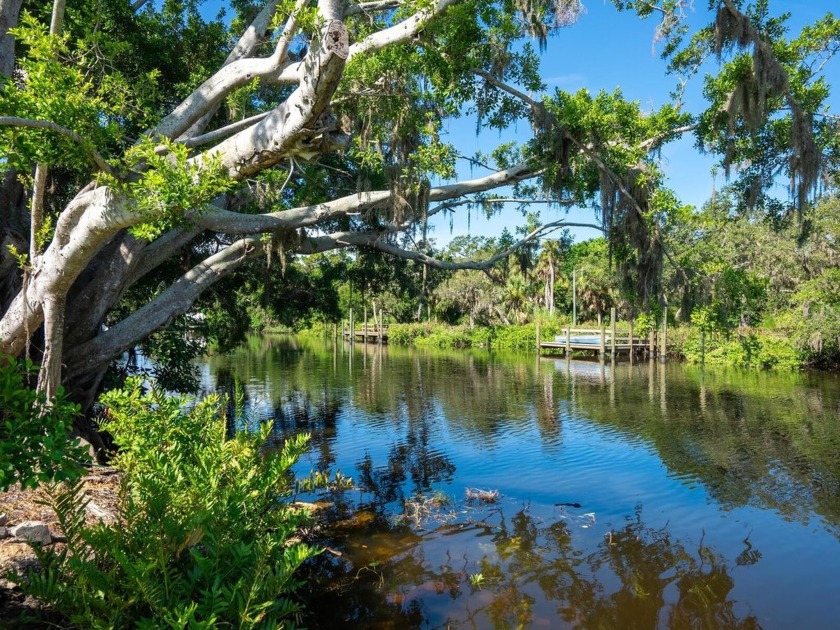 Don't miss this recently renovated, waterfront cottage, set - Beach Home for sale in Sarasota, Florida on Beachhouse.com