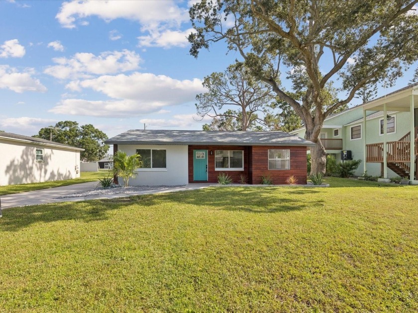 Welcome to this beautifully renovated 4-bedroom, 2-bathroom home - Beach Home for sale in St. Petersburg, Florida on Beachhouse.com