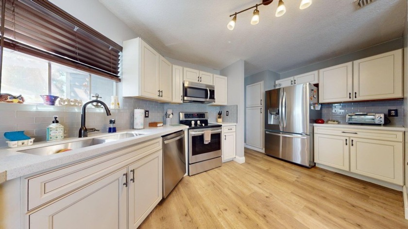 Step into this beautifully updated 3-bedroom, 2-bath - Beach Home for sale in West Palm Beach, Florida on Beachhouse.com