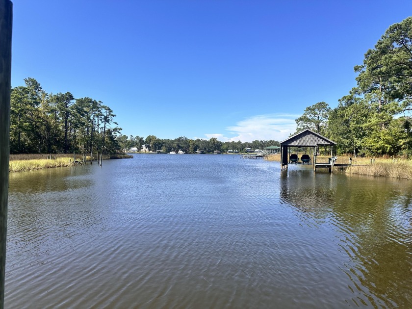 Winding thru the mature trees, absorb the beautiful of this 3.5 - Beach Home for sale in Freeport, Florida on Beachhouse.com