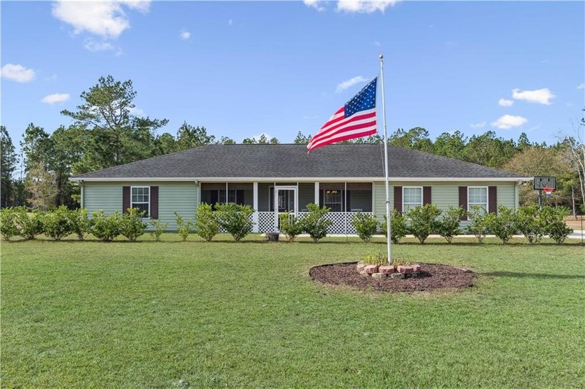 Welcome home to this charming 4-bedroom, 2-bath residence - Beach Home for sale in Woodbine, Georgia on Beachhouse.com