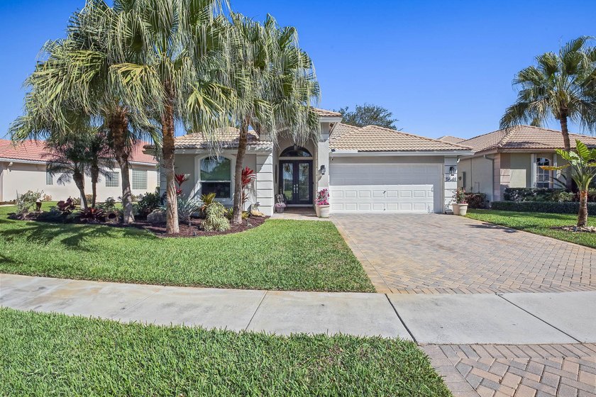 Nestled within a gated community in the All-Age Oakmont section - Beach Home for sale in Lake Worth, Florida on Beachhouse.com