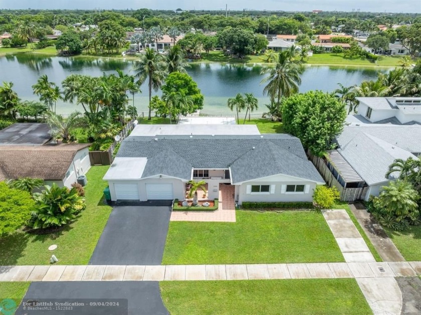 Discover this pristine Kendale Lakes home with breathtaking lake - Beach Home for sale in Miami, Florida on Beachhouse.com