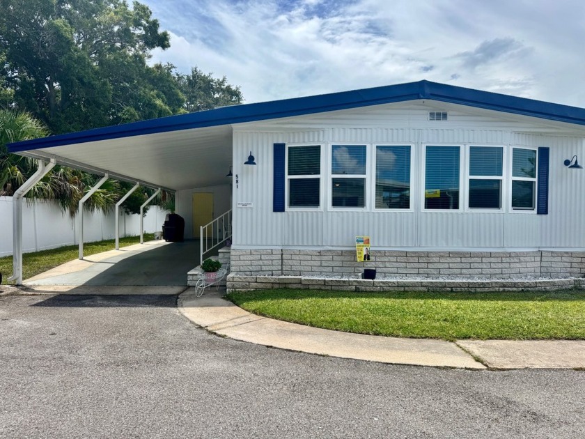 Make an offer on this move-in ready home in a Five Star 55+ - Beach Home for sale in Clearwater, Florida on Beachhouse.com