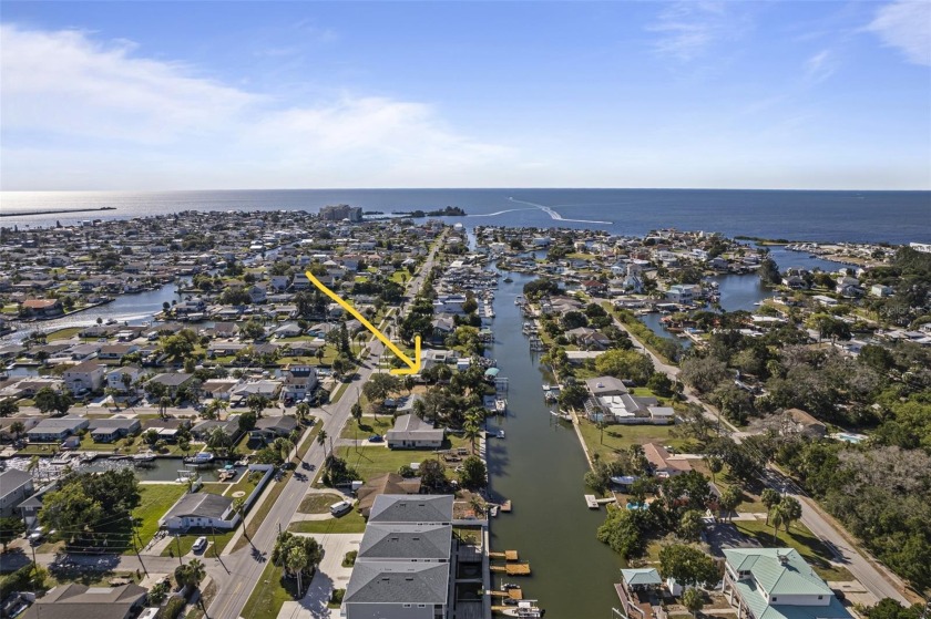 HIGH AND DRY ELEVATED WATERFRONT CANAL HOME...This recently - Beach Home for sale in Hudson, Florida on Beachhouse.com
