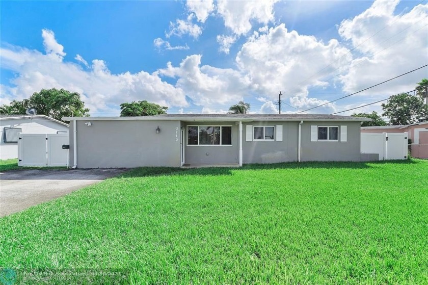 Turnkey 4-bedroom, 2-bathroom pool home in the desirable Bonnie - Beach Home for sale in Deerfield Beach, Florida on Beachhouse.com