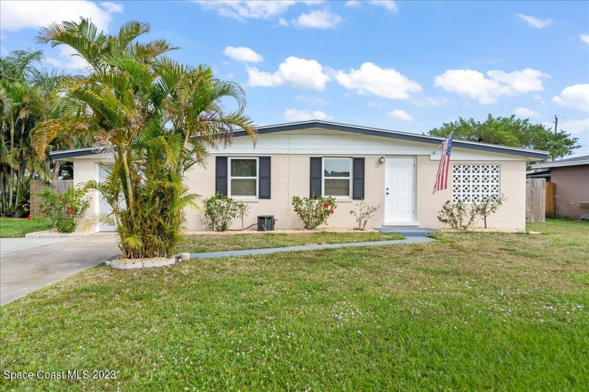 With charming updates throughout, this concrete block home is as - Beach Home for sale in Merritt Island, Florida on Beachhouse.com