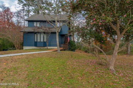 Take it easy at this unique and tranquil home that comes fully - Beach Home for sale in Morehead City, North Carolina on Beachhouse.com