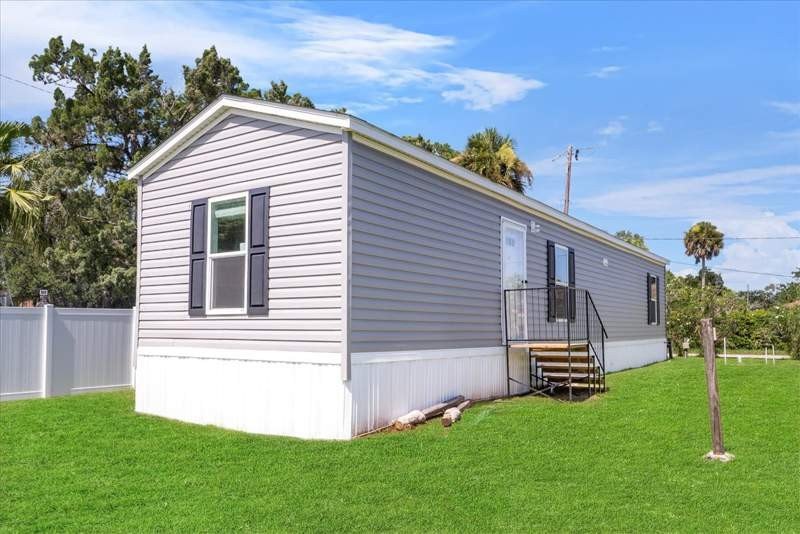 Welcome to this charming new-built Live Oak home boasting a - Beach Home for sale in New Smyrna Beach, Florida on Beachhouse.com